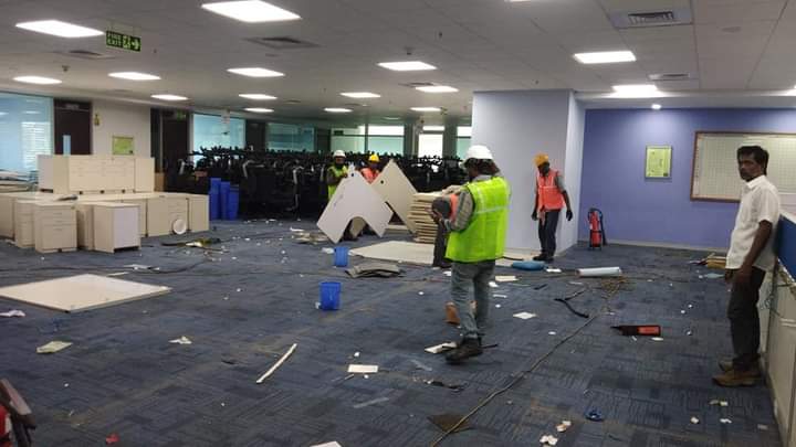 Our crew dismantling an open-plan office floor